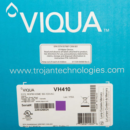 Product label on VIQUA VH410 UV water system packaging showing model details, voltage, and certification for home water purification.