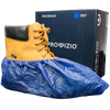 Waterproof shoe covers slipped over a work boot next to a dispenser box.